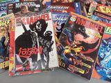a lot of comic books sitting on a table