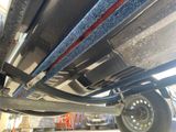 a close up view of the underside of a vehicle
