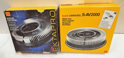 two boxed boxes of air cleaners sitting on a white surface