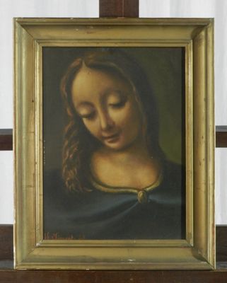 une photo d'un tableau représentant une femme, dans un cadre doré