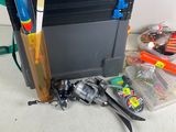 a tool box with tools on the floor next to a pair of scissors