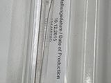 a close up of a piece of glass with a sticker on it