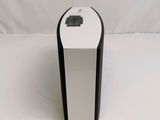 an image of a white and black speaker on a white background