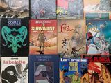 a lot of books that are sitting on a table