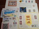 many different types of stamps on the table