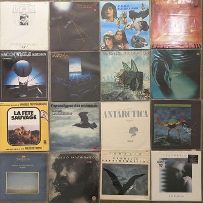a lot of different album covers on the wall