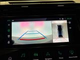 a picture of a car ' s rear view camera on the dashboard
