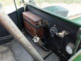 a suitcase sitting in the back of a truck