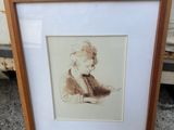a picture of a picture of a man sitting in a chair