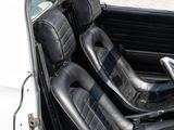 an image of a white car with black leather seats