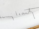 a close up of a plate with writing on it