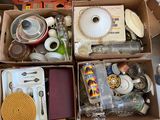 a box full of assorted items that are sitting on the floor