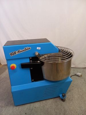 une image représentant une machine bleue surmontée d'un bol