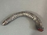 a metal object that is laying on a table