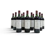 six bottles of wine are lined up in a row on a white surface