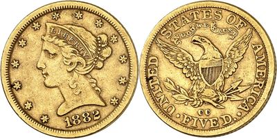 a gold coin with an eagle on the front and the back of it