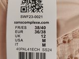 a close up of a label on a dress on a mannequin mannequin mannequin mannequin mannequin mannequin mannequin