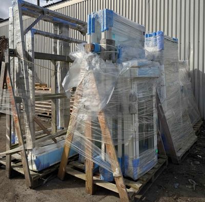 a pallet full of water bottles sitting on a pallet