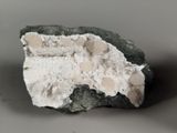 a piece of rock that has some kind of substance on it