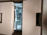 a box with a picture inside of it on a table