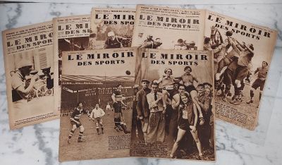 several old french newspaper covers of a group of men and women