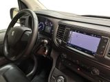 the interior of a car with a steering wheel, dashboard, and dash board