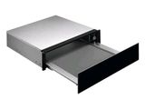 a drawer that is open on the side of the wall
