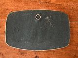 a skateboard that is laying on a wooden table