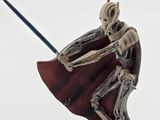 a figurine of a skeleton holding a sword and shield