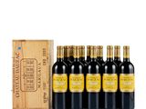 six bottles of red wine in a wooden box next to a wooden box