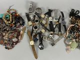 many different types of jewelry on the table