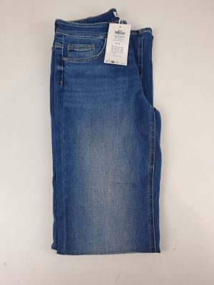 the back of a pair of blue jeans with a tag on it