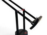 an image of a desk lamp that is on a white surface