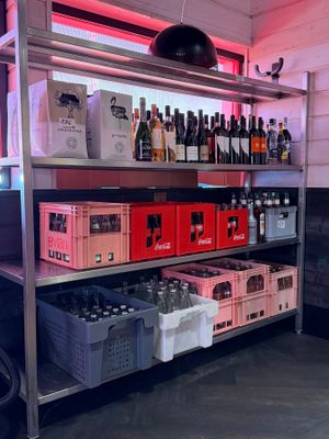 many bottles of wine on the shelves in the room