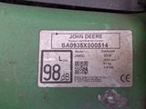 a close up of a label on a machine that says john deere