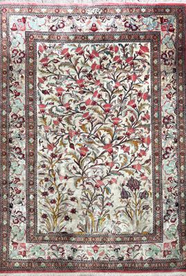 a rug with a floral design on it