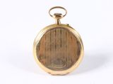 an image of a gold pocket watch sitting on a white surface