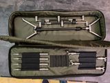 a suitcase with tools inside of it on the floor