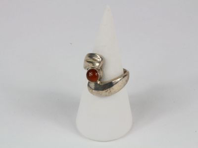sterling silver ring with carnel stone in the middle