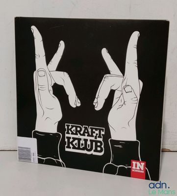 kraft krub hand sign on a black background with white lettering