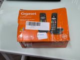 a box that has a cell phone in it on a table