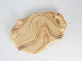 an image of a piece of wood that is shaped like a wave