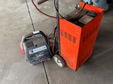 a small machine that is sitting on the ground