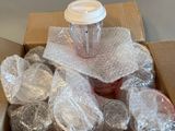 une boîte en carton contenant une tasse de café