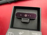 a box with a webcam in it on a red surface