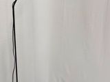 black metal floor lamp with a black base and a black shade