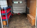 a van that has a bed in the back of it