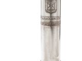 an image of a silver vase with a coat of arms on it