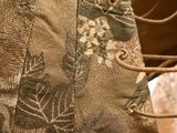 a close up of a pair of shoes and a bag