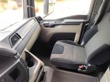 a view of the inside of a vehicle from the driver ' s seat